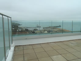 Sunrock Southern Infinty Glass Balustrades wind resistant to 200mph 
