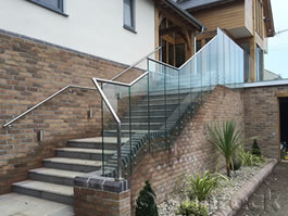 Sunrock Infinity Glass Stair Balustrades with handrails line steps 