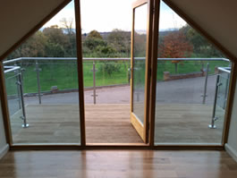 Glass and Steel Balcony with decking Worcestershire 